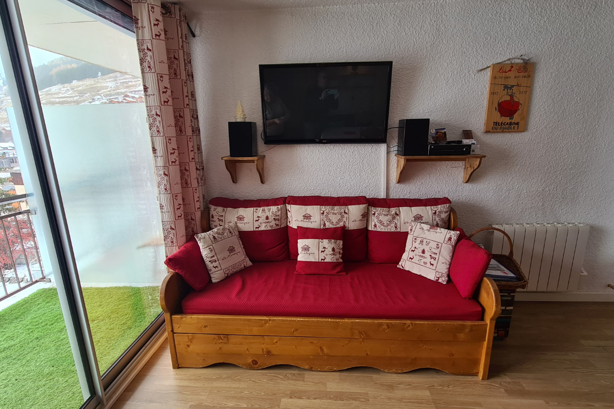 Le canapé avec deux lits gigogne - Location de vacances - les Deux Alpes