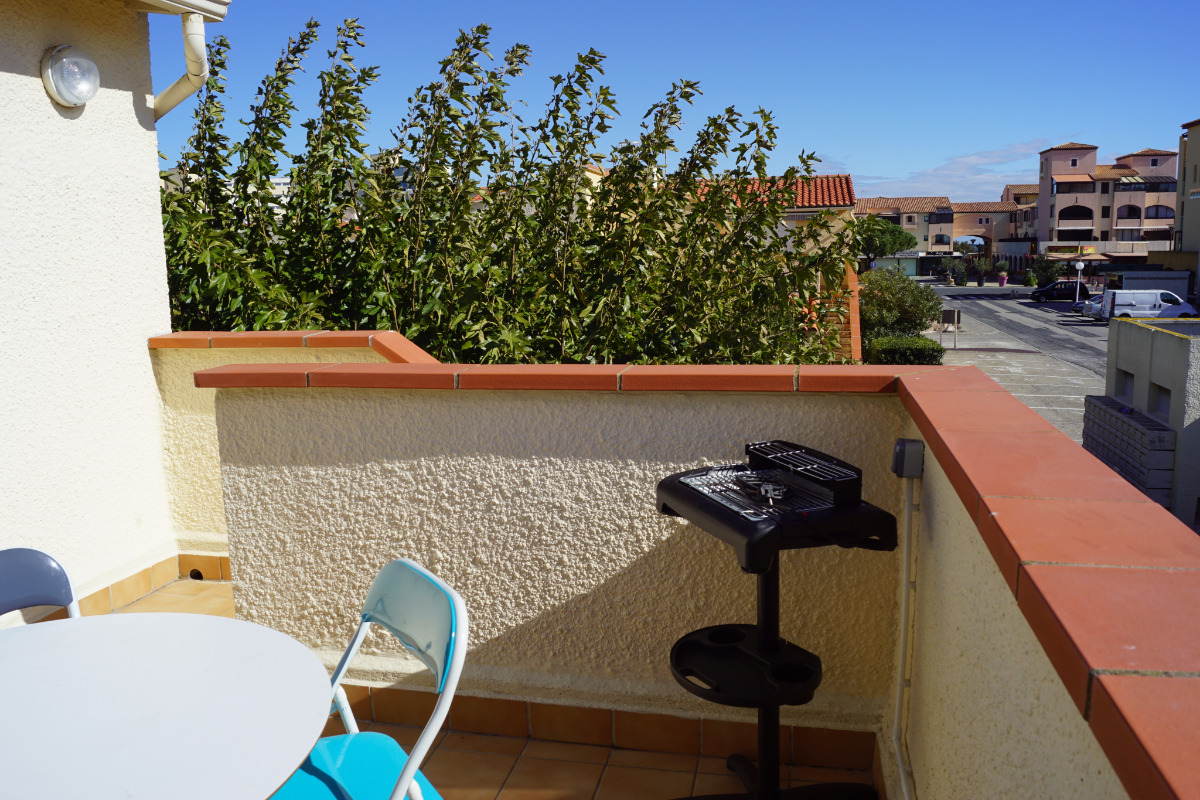 Terrasse avec barbecue - Location de vacances - Le Barcarès