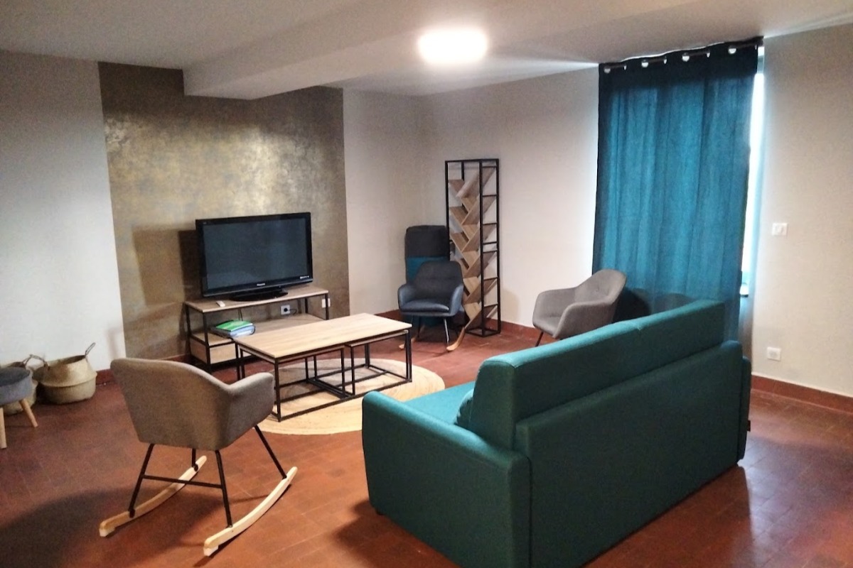 Gîte de Briante - salon télévision et jeux au 1er étage - Location de vacances - Saint-Lager